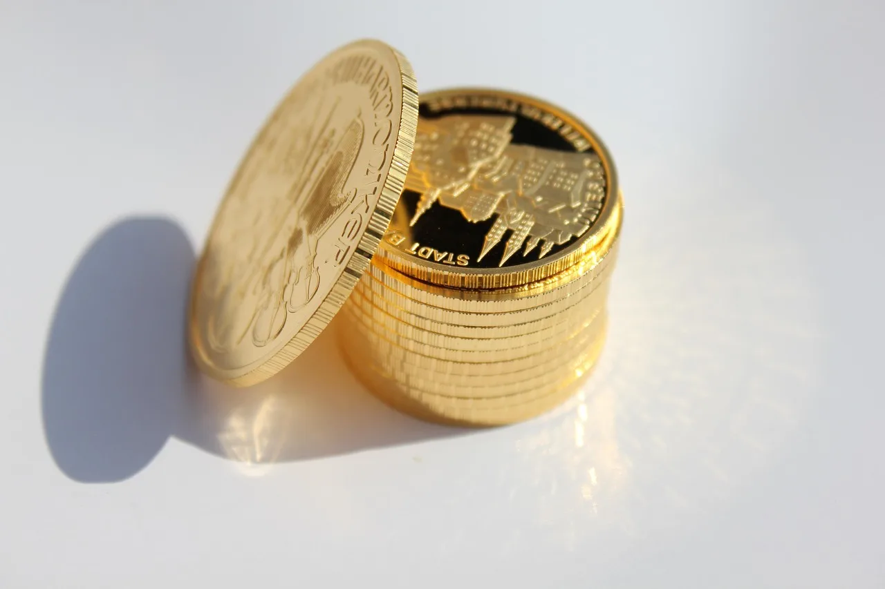 Goldmünzen als Symbol für Dividenden-Aristokraten, die ihre Dividende seit 25 Jahren erhöhen